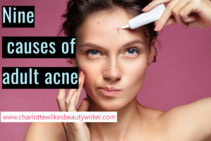 A women putting cream on adult acne